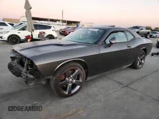 ✅ 2013 Dodge Challenger R/T • VIN: 2C3CDYBT7DH674305 • Лот: 89642955. Опубликован ранее на Copart с пробегом Не указан. Бесплатный доступ к архиву аукционных продаж из США и подробный отчёт об истории автомобиля на DreamBid. Изображение 1.