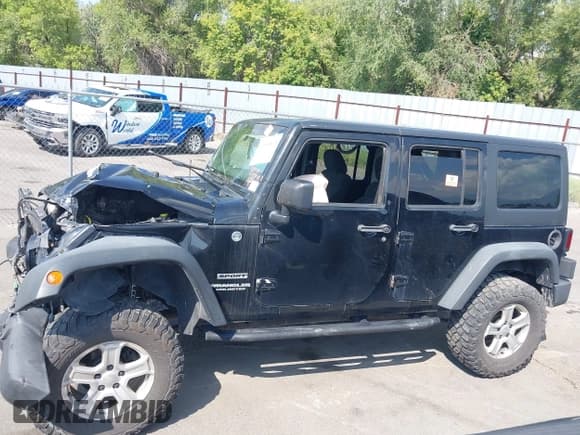 ✅ 2012 Jeep Wrangler Unlimited Sport • VIN: 1C4BJWDG2CL201563 • Lot: 43083863. Listed on IAAI with Not provided. Free auction sales archive from the USA and detailed vehicle history report at DreamBid. Image 14.