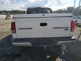 ✅ 2004 Dodge Dakota SLT • VIN: 1D7HG48N14S740131 • Lot: 72680914. Wystawiony na Copart z przebiegiem 99 799 mil. Bezpłatny archiwum sprzedaży aukcyjnych z USA i szczegółowy raport historii pojazdu na DreamBid. Zdjęcie 6.