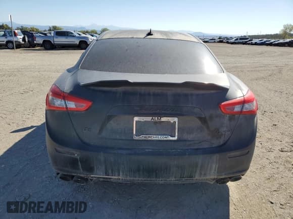 ✅ 2015 Maserati Ghibli S Q4 • VIN: ZAM57RTAXF1130599 • Lot: 80204685. Listed on Copart with Not provided. Free auction sales archive from the USA and detailed vehicle history report at DreamBid. Image 6.