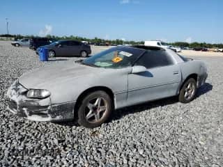 1999 Chevrolet Camaro z VIN 2G1FP22K4X2119705, wystawiony jako Copart lot #61094235 z przebiegiem Nie podano mil oraz Czysty tytuł • Clean title. Historia ofert i sprzedaży dostępna na DreamBid. Obrazek 1.