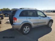 ✅ 2001 Toyota RAV4 • VIN: JTEHH20V110102617 • Lot: 82409715. Listed on Copart with 107,800 mi. Free auction sales archive from the USA and detailed vehicle history report at DreamBid. Image 3.