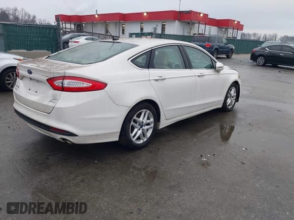 ✅ 2015 Ford Fusion SE • VIN: 3FA6P0HD1FR217763 • Lot: 43796569. Listed on IAAI with 204,738 mi. Free auction sales archive from the USA and detailed vehicle history report at DreamBid. Image 4.