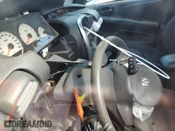 2003 Dodge Neon SXT z VIN 1B3ES56C23D170664, wystawiony jako Copart lot #51144025 z przebiegiem Nie podano mil oraz Szkoda całkowita • Salvage title. Historia ofert i sprzedaży dostępna na DreamBid. Obrazek 7.