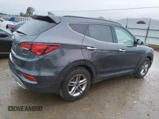 ✅ 2018 Hyundai Santa Fe 2.4L • VIN: 5XYZU3LB0JG560087 • Лот: 36490833. Опубликован ранее на Copart с пробегом 37 870 миль. Бесплатный доступ к архиву аукционных продаж из США и подробный отчёт об истории автомобиля на DreamBid. Изображение 3.