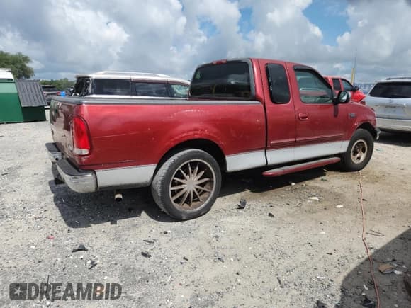 ✅ 2000 Ford F-150 XL • VIN: 1FTZX1721YNA09515 • Lot: 63215735. Listed on Copart with 188,149 mi. Free auction sales archive from the USA and detailed vehicle history report at DreamBid. Image 3.