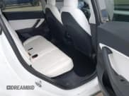 ✅ 2021 Tesla Model Y Standard Range • VIN: 5YJYGDED9MF121828 • Lot: 42119518. Listed on IAAI with 34,454 mi. Free auction sales archive from the USA and detailed vehicle history report at DreamBid. Image 8.