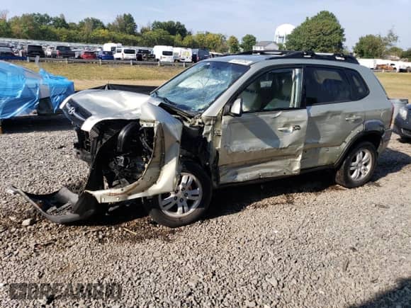 2007 Hyundai Tucson SE z VIN KM8JN72D27U640529, wystawiony jako Copart lot #72318784 z przebiegiem Nie podano mil oraz Szkoda całkowita • Salvage title. Historia ofert i sprzedaży dostępna na DreamBid. Obrazek 1.