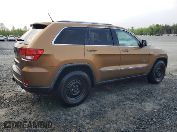 ✅ 2011 Jeep Grand Cherokee Laredo • VIN: 1J4RR4GGXBC697695 • Lot: 59696055. Listed on Copart with 148,537 mi. Free auction sales archive from the USA and detailed vehicle history report at DreamBid. Image 3.