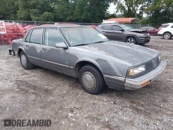 ✅ 1989 Oldsmobile Delta • VIN: 1G3HN54C1K1809364 • Лот: 42963729. Опубликован ранее на IAAI с пробегом 168 541 миль. Бесплатный доступ к архиву аукционных продаж из США и подробный отчёт об истории автомобиля на DreamBid. Изображение 1.