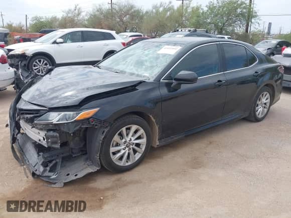 2022 Toyota Camry LE z VIN 4T1C11AK0NU651396, wystawiony jako IAAI lot #43411892 z przebiegiem 62 231 mil mil oraz . Historia ofert i sprzedaży dostępna na DreamBid. Obrazek 18.