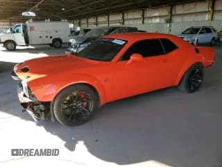 ✅ 2022 Dodge Challenger SRT Hellcat Redeye Widebody • VIN: 2C3CDZL99NH242003 • Lot: 38351624. Wystawiony na Copart z przebiegiem 6 876 mil. Bezpłatny archiwum sprzedaży aukcyjnych z USA i szczegółowy raport historii pojazdu na DreamBid. Zdjęcie 1.