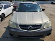 ✅ 2004 Mazda Tribute DX • VIN: 4F2YZ02B74KM13874 • Лот: 65422864. Опубликован ранее на Copart с пробегом 288 215 миль. Бесплатный доступ к архиву аукционных продаж из США и подробный отчёт об истории автомобиля на DreamBid. Изображение 5.