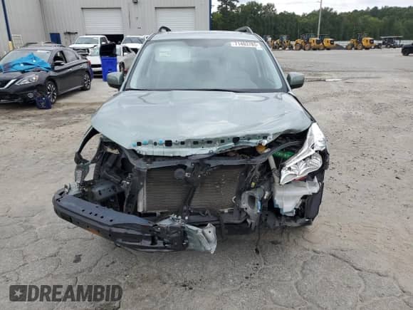 2016 Subaru Forester Limited с VIN JF2SJAHC0GH421708, выставлен на аукционе Copart как лот 71403785 с пробегом 74 546 миль миль и Списание • Salvage title. История ставок и продаж доступна на DreamBid. Изображение 5.