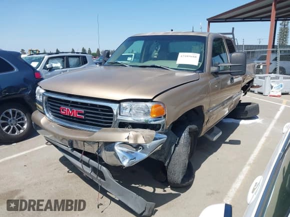 ✅ 2001 GMC Sierra 1500 SLE • VIN: 1GTEK19T11E181309 • Лот: 42105688. Опубликован ранее на IAAI с пробегом 158 314 миль. Бесплатный доступ к архиву аукционных продаж из США и подробный отчёт об истории автомобиля на DreamBid. Изображение 2.