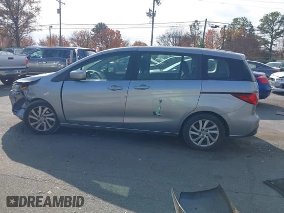 ✅ 2012 Mazda 5 Sport • VIN: JM1CW2BL6C0132196 • Lot: 43731507. Listed on IAAI with 250,136 mi. Free auction sales archive from the USA and detailed vehicle history report at DreamBid. Image 14.