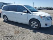 ✅ 2014 Volkswagen Routan • VIN: 2C4RVADG8ER135455 • Lot: 51336385. Listed on Copart with 86,341 mi. Free auction sales archive from the USA and detailed vehicle history report at DreamBid. Image 4.