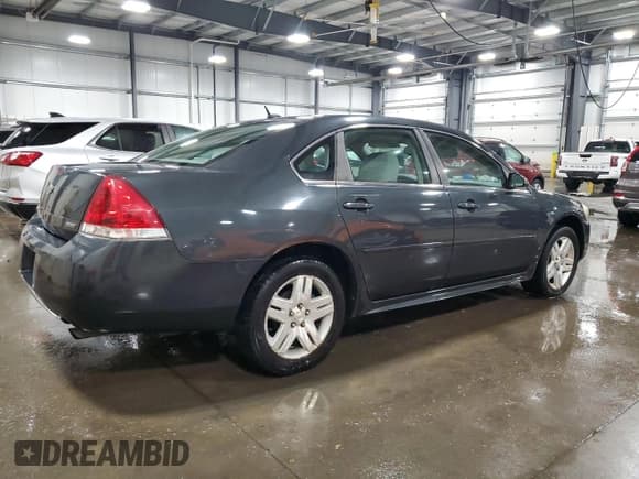 ✅ 2014 Chevrolet Impala LT • VIN: 2G1WB5E35E1112642 • Lot: 85209705. Listed on Copart with 161,688 mi. Free auction sales archive from the USA and detailed vehicle history report at DreamBid. Image 3.
