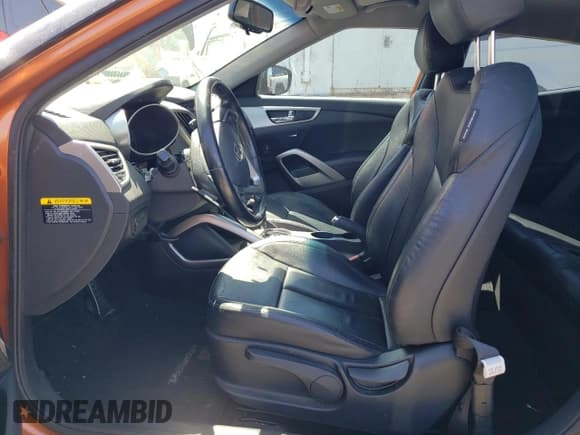 ✅ 2015 Hyundai Veloster • VIN: KMHTC6AD7FU222914 • Lot: 67771444. Listed on Copart with 67,474 mi. Free auction sales archive from the USA and detailed vehicle history report at DreamBid. Image 7.