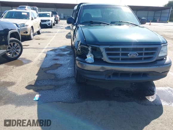 ✅ 2001 Ford F-150 XL • VIN: 1FTPF17L51NB38169 • Lot: 41999741. Listed on IAAI with 118,360 mi. Free auction sales archive from the USA and detailed vehicle history report at DreamBid. Image 6.