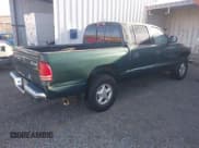 ✅ 2000 Dodge Dakota Sport • VIN: 1B7HG2AZ4YS724393 • Lot: 43645937. Wystawiony na IAAI z przebiegiem 144 705 mil. Bezpłatny archiwum sprzedaży aukcyjnych z USA i szczegółowy raport historii pojazdu na DreamBid. Zdjęcie 4.