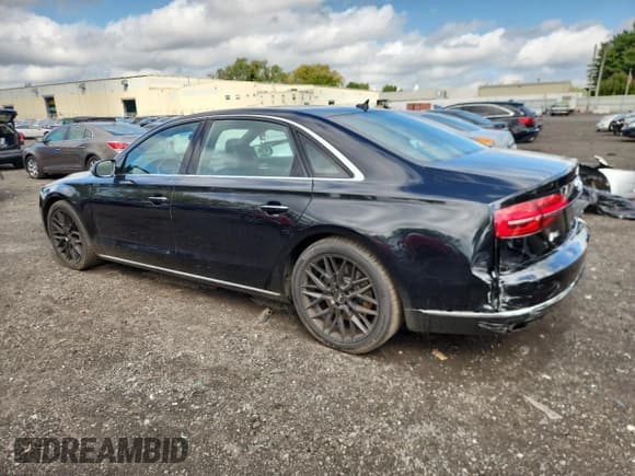 ✅ 2015 Audi A8 4.0T • VIN: WAU32AFD8FN038298 • Лот: 68454835. Опубликован ранее на Copart с пробегом 60 085 миль. Бесплатный доступ к архиву аукционных продаж из США и подробный отчёт об истории автомобиля на DreamBid. Изображение 2.