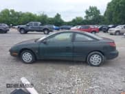 ✅ 1997 Saturn SC • VIN: 1G8ZF1285VZ100218 • Лот: 42881895. Опубликован ранее на IAAI с пробегом 114 002 миль. Бесплатный доступ к архиву аукционных продаж из США и подробный отчёт об истории автомобиля на DreamBid. Изображение 14.