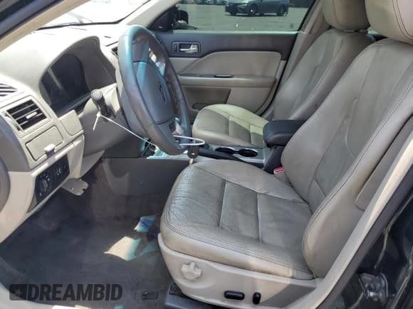 ✅ 2010 Ford Fusion Hybrid • VIN: 3FADP0L33AR185719 • Лот: 59821115. Опубликован ранее на Copart с пробегом 154 019 миль. Бесплатный доступ к архиву аукционных продаж из США и подробный отчёт об истории автомобиля на DreamBid. Изображение 7.