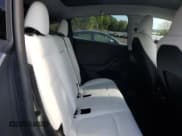 ✅ 2023 Tesla Model Y Long Range • VIN: 7SAYGDEE2PA106990 • Lot: 71507195. Wystawiony na Copart z przebiegiem 30 400 mil. Bezpłatny archiwum sprzedaży aukcyjnych z USA i szczegółowy raport historii pojazdu na DreamBid. Zdjęcie 11.