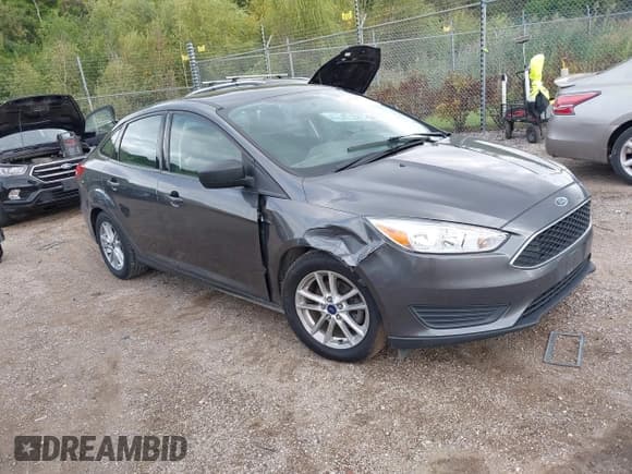 ✅ 2017 Ford Focus SE • VIN: 1FADP3F24HL242894 • Lot: 43307716. Listed on IAAI with 126,501 mi. Free auction sales archive from the USA and detailed vehicle history report at DreamBid. Image 1.