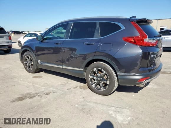 ✅ 2017 Honda CR-V Touring • VIN: 5J6RW1H9XHL004303 • Лот: 90851005. Опубликован ранее на Copart с пробегом 189 462 миль. Бесплатный доступ к архиву аукционных продаж из США и подробный отчёт об истории автомобиля на DreamBid. Изображение 2.