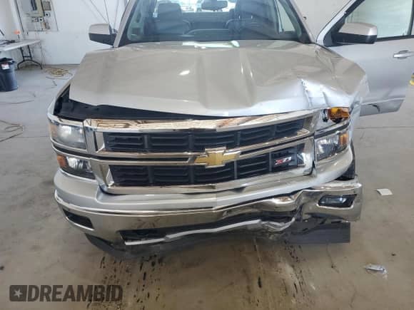 2015 Chevrolet Silverado 1500 LT z VIN 1GCVKREC8FZ204203, wystawiony jako Copart lot #85107205 z przebiegiem 120 091 mil mil oraz Szkoda całkowita • Salvage title. Historia ofert i sprzedaży dostępna na DreamBid. Obrazek 11.