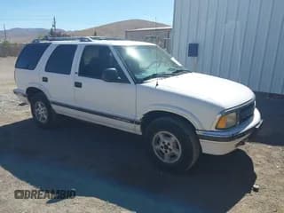 ✅ 1995 Chevrolet Blazer • VIN: 1GNDT13W1S2151071 • Lot: 42938223. Wystawiony na IAAI z przebiegiem 156 788 mil. Bezpłatny archiwum sprzedaży aukcyjnych z USA i szczegółowy raport historii pojazdu na DreamBid. Zdjęcie 1.