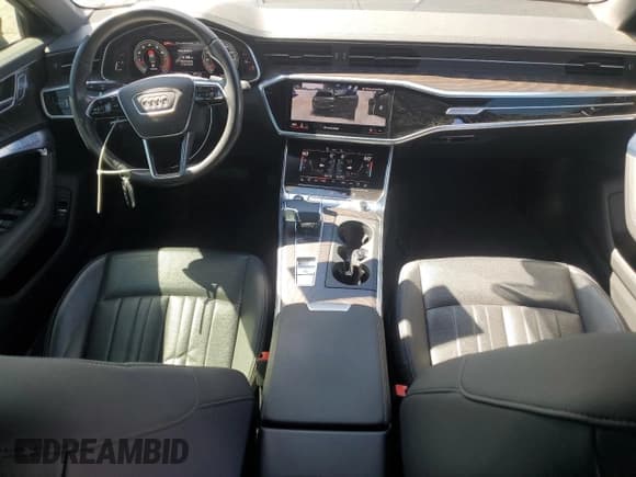 ✅ 2021 Audi A6 Premium Plus • VIN: WAUL2AF2XMN049251 • Лот: 66134285. Опубликован ранее на Copart с пробегом 42 698 миль. Бесплатный доступ к архиву аукционных продаж из США и подробный отчёт об истории автомобиля на DreamBid. Изображение 8.