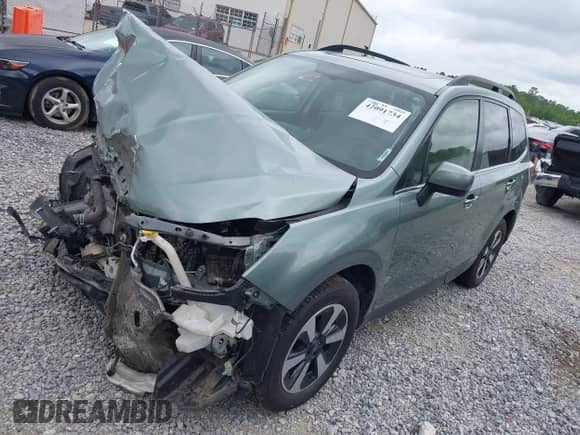 2018 Subaru Forester Limited with VIN JF2SJAJCXJH416792, listed as a IAAI auction lot 42091734 with 108,033 mi miles and . Bid and sale history available at DreamBid. Image 17.