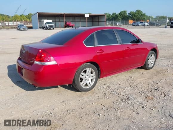 ✅ 2014 Chevrolet Impala LT • VIN: 2G1WB5E34E1163971 • Lot: 43047669. Listed on IAAI with 215,678 mi. Free auction sales archive from the USA and detailed vehicle history report at DreamBid. Image 4.