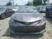 2023 Toyota Camry LE z VIN 4T1C11BK6PU102562, wystawiony jako Copart lot #65087875 z przebiegiem Nie podano mil oraz Szkoda całkowita • Salvage title. Historia ofert i sprzedaży dostępna na DreamBid. Obrazek 5.