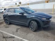 ✅ 2023 Mazda CX-30 Premium • VIN: 3MVDMBDY2PM503035 • Lot: 80368565. Wystawiony na Copart z przebiegiem 51 174 mil. Bezpłatny archiwum sprzedaży aukcyjnych z USA i szczegółowy raport historii pojazdu na DreamBid. Zdjęcie 4.