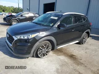 ✅ 2021 Hyundai Tucson SEL • VIN: KM8J33AL4MU306649 • Lot: 67446545. Wystawiony na Copart z przebiegiem 75 169 mil. Bezpłatny archiwum sprzedaży aukcyjnych z USA i szczegółowy raport historii pojazdu na DreamBid. Zdjęcie 1.