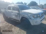 ✅ 2010 Toyota Tacoma PreRunner • VIN: 3TMJU4GNXAM103720 • Lot: 42994037. Listed on IAAI with 214,592 mi. Free auction sales archive from the USA and detailed vehicle history report at DreamBid. Image 1.