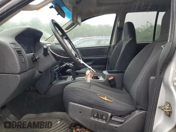 ✅ 2004 Jeep Grand Cherokee Laredo • VIN: 1J4GW48S74C288625 • Lot: 61290805. Listed on Copart with 194,615 mi. Free auction sales archive from the USA and detailed vehicle history report at DreamBid. Image 7.