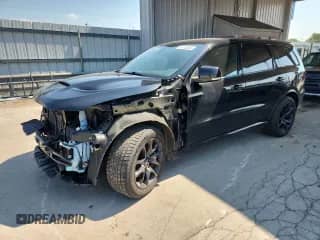 2021 Dodge Durango R/T with VIN 1C4SDJCTXMC575669, listed as a Copart auction lot 61716245 with 83,311 mi miles and Salvage title. Bid and sale history available at DreamBid. Image 1.