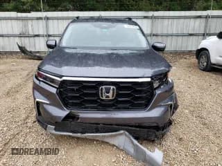 ✅ 2023 Honda Pilot Elite • VIN: 5FNYG1H86PB015516 • Lot: 69514093. Wystawiony na Copart z przebiegiem 11 500 mil. Bezpłatny archiwum sprzedaży aukcyjnych z USA i szczegółowy raport historii pojazdu na DreamBid. Zdjęcie 5.