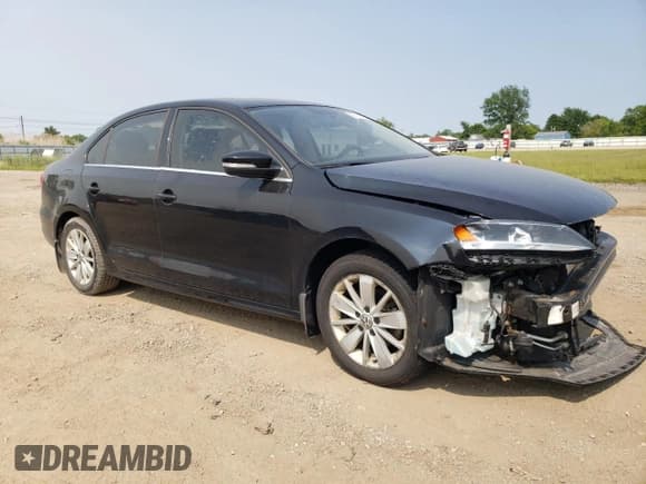✅ 2015 Volkswagen Jetta SE • VIN: 3VWD17AJ3FM282085 • Lot: 59718875. Listed on Copart with 87,681 mi. Free auction sales archive from the USA and detailed vehicle history report at DreamBid. Image 4.