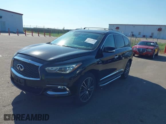 ✅ 2018 Infiniti QX60 • VIN: 5N1DL0MM8JC520559 • Lot: 43037554. Listed on IAAI with 122,805 mi. Free auction sales archive from the USA and detailed vehicle history report at DreamBid. Image 17.