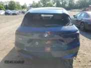 ✅ 2023 BMW iX xDrive50 • VIN: WB523CF01PCM88002 • Lot: 69778594. Wystawiony na Copart z przebiegiem 10 420 mil. Bezpłatny archiwum sprzedaży aukcyjnych z USA i szczegółowy raport historii pojazdu na DreamBid. Zdjęcie 6.