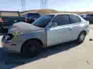 2005 Hyundai Accent GLS z VIN KMHCG35C55U337255, wystawiony jako Copart lot #43761985 z przebiegiem 192 585 mil mil oraz Szkoda całkowita • Salvage title. Historia ofert i sprzedaży dostępna na DreamBid. Obrazek 1.