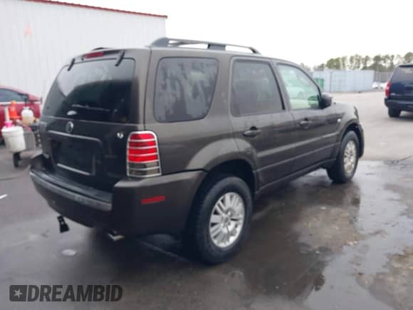 2005 Mercury Mariner Luxury z VIN 4M2YU56195DJ14917, wystawiony jako IAAI lot #41538962 z przebiegiem 210 486 mil mil oraz . Historia ofert i sprzedaży dostępna na DreamBid. Obrazek 4.