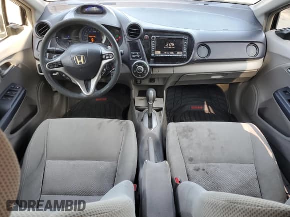 ✅ 2010 Honda Insight EX • VIN: JHMZE2H70AS031663 • Лот: 71533534. Опубликован ранее на Copart с пробегом 176 227 миль. Бесплатный доступ к архиву аукционных продаж из США и подробный отчёт об истории автомобиля на DreamBid. Изображение 8.