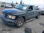 2008 Dodge Dakota z VIN 1D7HW32KX8S560888, wystawiony jako IAAI lot #42025097 z przebiegiem 46 639 mil mil oraz . Historia ofert i sprzedaży dostępna na DreamBid. Obrazek 2.